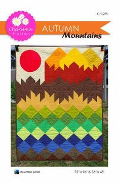 an image of a colorful quilt on the cover of a book with text that reads autumn mountains