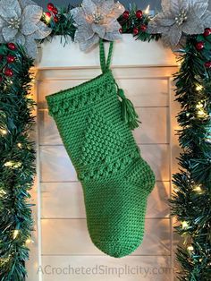 a crocheted christmas stocking hanging from a fireplace with text overlay that reads free crochet pattern christmas stockings