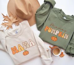 ABOUT OUR Mama and Mamas Pumpkin Fall Sweatshirt 👉 Unisex Sweatshirt - 50% cotton, 50% polyester.  - Made by specially spinned fibers that make very strong and smooth fabric.  - These sweatshirts have-ribbed knit collars to bolster shaping. - Printed and shipped from the USA. 🌱 CARE INSTRUCTIONS - Wash inside out with like colors. - Tumble dry or hang to dry. - Try not to iron directly over the design. Iron if necessary! 📦 HOW TO ORDER  1) Please, check and review all photos  2) Choose your s Matching Cotton Sweatshirt For Fall, Cotton Fall Sweatshirt, Cute Name Print Tops For Fall, Cute Tops With Name Print For Fall, Customizable Cute Tops For Fall, Family Matching Cotton Sweatshirt For Fall, Fall Sweatshirt Vinyl, Mom And Baby Outfits, Outfit Matching