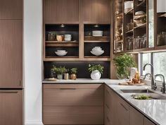 the kitchen is clean and ready for us to use it's counters are made of wood