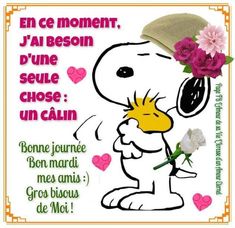 a snoopy with flowers on his head and the words in french are written below