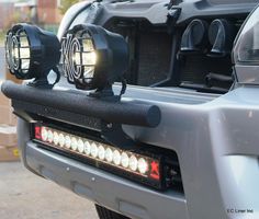 two lights on the front of a truck