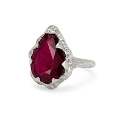 14k gold, diamond, and a 7ct pear shaped ruby, fracture filled for clarity enhancement, from the Queen collection.