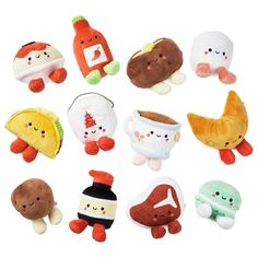 a bunch of stuffed animals that are in the shape of small food items on a white background