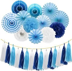 blue and white paper fan decorations hanging from a string with tassels on it