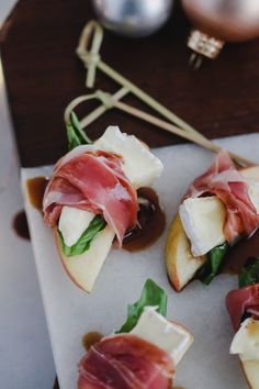 small appetizers with meat and cheese on them