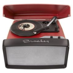 an old fashioned record player with its case open