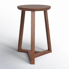 a small wooden table with one leg bent down and the other half turned upside down