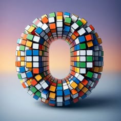 the letter o is made up of multicolored squares and rectangles in different sizes