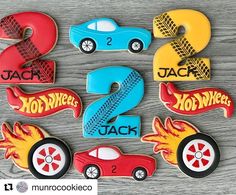 the cookies are decorated to look like cars and numbers for each child's birthday