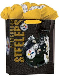 a black and yellow bag with a football helmet on the front is filled with balls