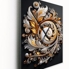 an artistic painting on the wall with gold and silver accents, including swirls and leaves