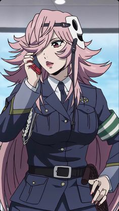 a woman in uniform talking on a cell phone