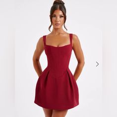 Janiyah Is The Dress For Party Season With The Prettiest Silhouette. This Mini Is Cut From A Premium, Structured Woven Fabric With A Corseted Body That Cinches The Waist And Drops To A Low V Shape. The Look Is Complete With An Iconic Voluminous Skirt. Colour: Wine. Premium Non Stretch Woven Fabric. Square Neckline. Thick, Adjustable Straps. Corseted Body With Drop V Shape. Voluminous Skirt. Zip Closure To Back. Mini Length. Model Is An Xs And Is Wearing An Xs. Model’s Measurements: Dress Size: X Backless Corset Dress, Dark Red Short Dress, Homecoming Dresses Corset, Dress For Party, Wine Dress, Maxi Dress Sale, Spaghetti Strap Mini Dress, Winter Formal, Dark Feminine