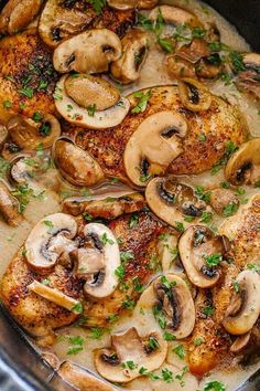 chicken with mushrooms and parsley in a pan