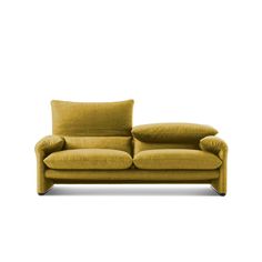 a yellow couch with two pillows on it's back and one arm facing the camera