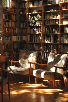 the sun shines on chairs and bookshelves in an empty room