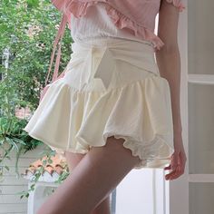 Kawaii Aesthetic Korean Fashion V Waist Pastel Chiffon Micro Skirt Bloomers Size S 40-50kgSize M 50-55kgSize L 55-60kgSize XL 60-65kg *This product fits true to size. *Standard shipping time to the US is 9-19 business days. Please consult our shipping page for shipping time estimates for other countries. *Please check the measurements/size chart very carefully when ordering from The Kawaii Factory. Most of our clothes come in Asian sizes, which are generally 1-2 sizes smaller than US/EU sizes. B Beige Feminine Skirt With Ruffles, Feminine Beige Ruffled Skirt, Feminine High-waist Mini Skirt For Spring, Cute Flowy Skirt For Summer, Feminine High Waist Mini Skirt For Spring, Cream Casual Ruffled Bottoms, Summer Party Beige Mini Skirt, High-waist Ruffled Mini Skirt For Summer, High Waist Ruffled Mini Skirt For Summer