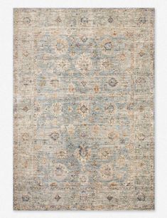 an area rug with blue and beige colors