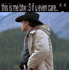 a man wearing a cowboy hat and jacket with the words, this is me btw 3 if even care