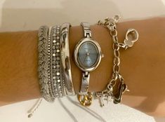 Bracelet Stacks Silver, Jewellery Stacks Silver, Silver Bracelet Stack Aesthetic, Silver Watch Stack, Silver Stack Jewelry, Stacked Jewelry Silver, Bracelet Stack With Watch, Watch And Bracelet Stack, Silver Jewelry Stack