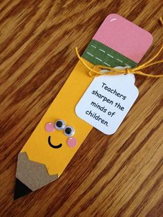 a bookmark made to look like a pencil with a teacher's message on it