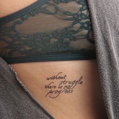 a woman with a tattoo on her stomach saying without struggle there is no progress