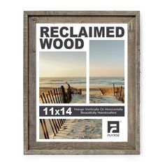 a wooden frame with the words reclaimed wood on it and an image of a beach in the background