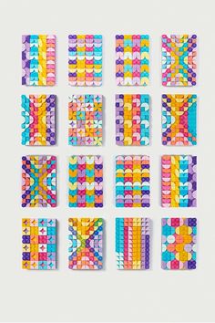 six different colored squares are arranged in the shape of an abstract pattern on a white background