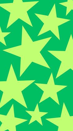 a green background with stars in the shape of large and small stars, all on top of one another