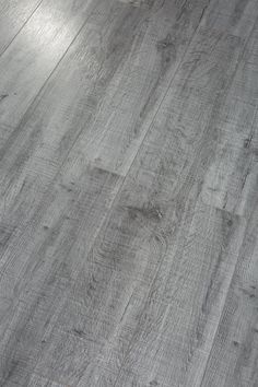 an image of wood flooring that looks like it has been painted in grey tones