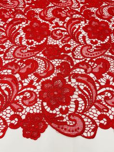 Fitted Red Lace For Party, Elegant Red Fitted Embroidered Fabric, Elegant Fitted Red Embroidered Fabric, Red Embroidered Lace Fabric For Party, Red Lace Fabric With Floral Embroidery, Red Embroidered Fabric With Lace Work For Wedding, Elegant Red Embroidered Fabric For Wedding, Elegant Red Embroidered Fabric With Floral Details, Ceremonial Lace Embroidered Fabric With Lace Trim