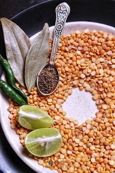 a white plate topped with beans and spices