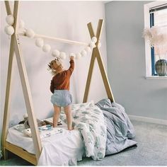 How fun is this twin sized teepee bed frame?! This is the perfect combination of fun for your little one in a timeless and simplistic style. This is a sturdy product made from unfinished solid knot free furniture grade poplar. You can stain or paint any color you wish or you can leave the item unfinished. Your bed purchase plants trees too! We plant one tree for every bed sold through One Tree Planted foundation! Available in either twin or full size. Color: Brown. Teepee Bed Frame, Montessori Toddler Room, Montessori Toddler Rooms, Twin House Bed, Toddler House Bed, Montessori Floor Bed, Toddler Floor Bed, Teepee Bed, House Frame Bed