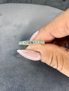 0.75 ct. tw. in natural Swiss blue topaz eternity wedding 2 mm ring. AAA Swiss Blue Topaz. Handcrafted in your choice of 14k Gold, 18k Gold or Platinum 950 setting. We also offer a 1-Year Layaway program. You can reach us at 1-888-967-5353 to speak to one of our jewelry specialist. Eternity Wedding Ring, Swiss Blue Topaz, Gold Platinum, To Speak, Blue Topaz, Wedding Ring, 1 Year, Topaz, Platinum