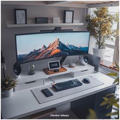 a desktop computer sitting on top of a white desk