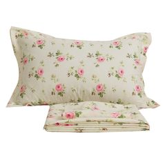 two pillows with pink roses on them