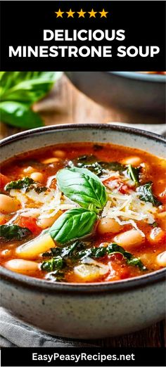 a bowl of minestone soup with spinach leaves on top and text overlay