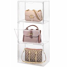 three clear shelves with purses and handbags on top of each shelf, one holding a purse