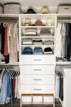 an organized closet with clothes and hats