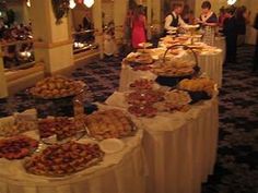 a buffet table with many different types of food on it