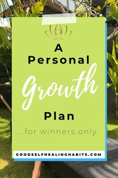 a person holding a sign that says, a personal growth plan for winners only