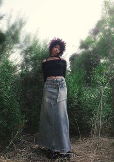 This maxi skirt has a denim construction, two adjustable belt straps in front, back pockets, and a front button and zipper closure. Jean Maxi Skirt, Maxi Skirt Denim, Current Mood Clothing, Denim Streetwear, Denim Skirt Outfits, Maxi Skirt Outfits, Worry Less, Pride Outfit, Denim Maxi