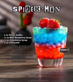 the spider - man cocktail is served in a colorful glass with strawberries on top