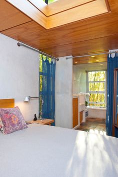 Rustic Canyon, Los Angeles elegant light filled bedroom with wooden ceiling, cutout skylight & attached bathroom. Rustic Master Suite, Modern Home Remodel, Hillside Houses, Rustic Master, Modern Remodel, Wooden Ceilings, Elegant Bedroom, Los Angeles Homes