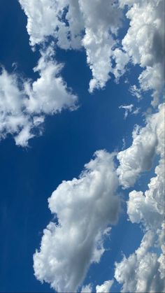 the sky is filled with clouds and blue skies