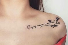 a woman with a tattoo on her shoulder that says, enjoy every moment and flowers