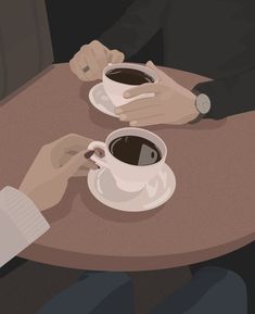 two people sitting at a table with cups of coffee