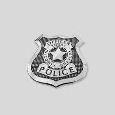 a police badge with the words brooklyn nine nine written on it's back side