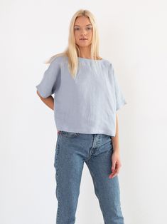 "BEE is a simple loose fitting short sleeve linen top. DETAILS - Boat neckline - Short sleeve - Kimono sleeves - Pullover design - Cropped length - 100% lightweight European linen fabric - Cut and sewn to order just for you in our studio COLOR - Bluestone, you can also choose other colors above - Fabric samples are available here https://www.etsy.com/listing/586569696/linen-fabric-samples SIZING & FIT - Fits true to size - Length is approximately 20 inches / 51.5 cm - Bust (pit to pit) is ap Flax Short Sleeve Top For Summer, Blue Linen Crew Neck Top, Flax Color Cotton Short Sleeve Tops, Flax Color Short Sleeve Cotton Tops, Blue Linen Tops For Everyday, Short Sleeve Cotton Tops In Flax Color, Short Sleeve Flax Top For Summer, Relaxed Linen Short Sleeve T-shirt, Minimalist Short Sleeve Summer Tops